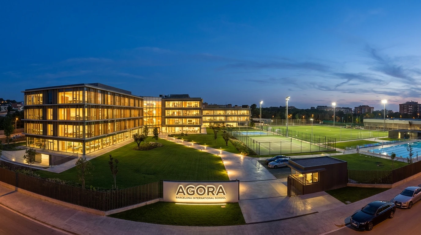 Agora Barcelona International School campus at dusk